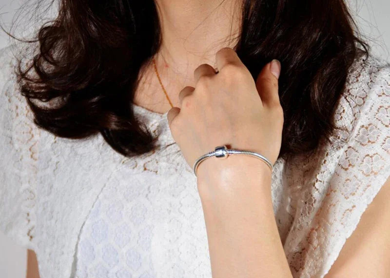 Dijes de plata 925: cómo armar tu pulsera de fe paso a paso