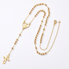 Collar Rosario Dorado en Y con corazón calado de la Virgen María y cruz – vista completa del rosario dorado en Y sobre fondo blanco