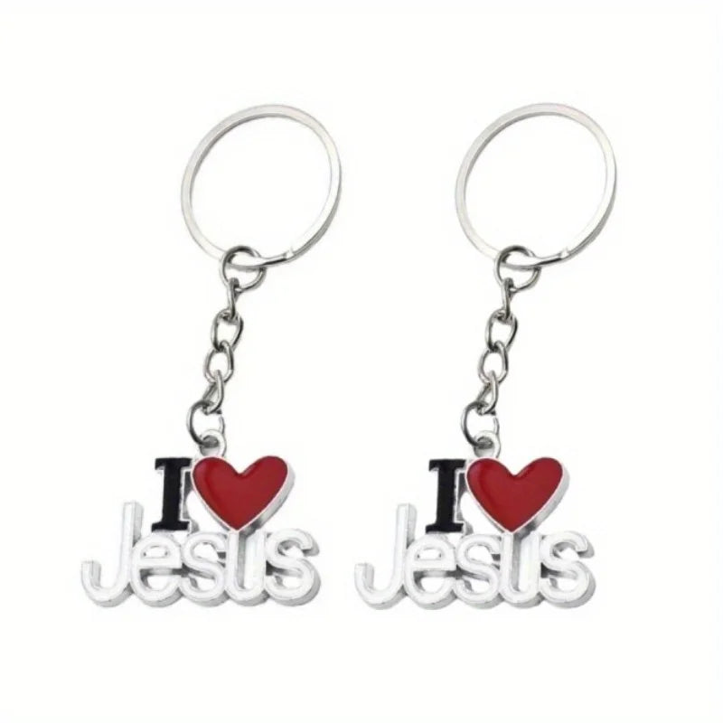 Llavero 'I Love Jesus' de Aleacion con Corazon sobre superficie de madera — presentacion del producto