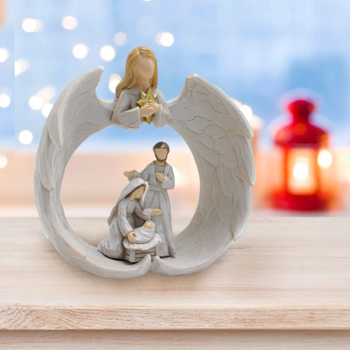 Ángel con la Sagrada Familia en Resina