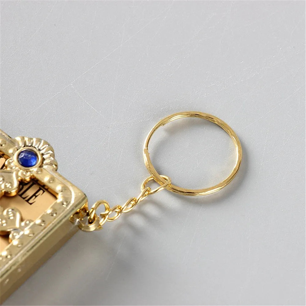 Llavero de la Biblia inglesa de edición de bolsillo, llavero de libro inglés cristiano, llavero de la Biblia de cuero de la revolución de Pvc A348