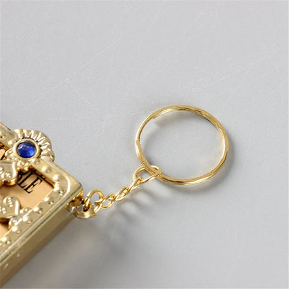 Llavero de la Biblia inglesa de edición de bolsillo, llavero de libro inglés cristiano, llavero de la Biblia de cuero de la revolución de Pvc A348