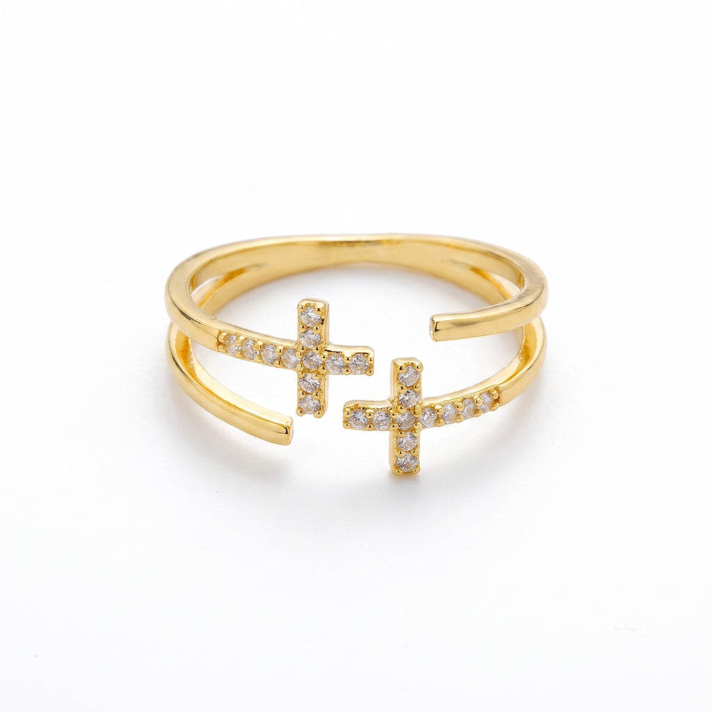 Anillo doble cruz de circonias dorado — vista en ángulo
