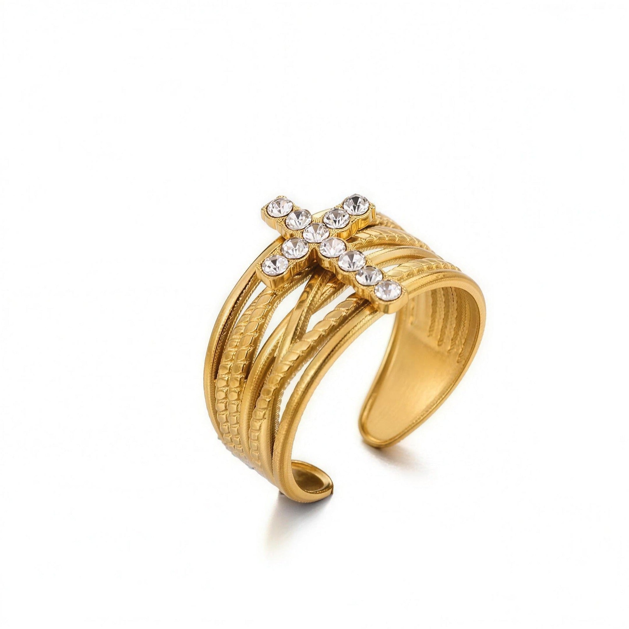 Anillo entrelazado con cruz de circonias en acero dorado — vista de producto