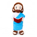 Peluche de Jesús con la Biblia abierta y manto azul — vista completa